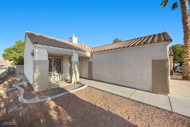 Mediterranean / spanish house featuring a tiled ro