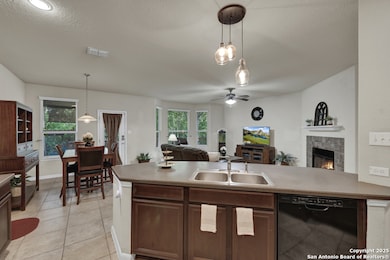 Kitchen open to breakfast and den area