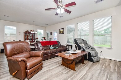 A spacious, well-lit living area with large window