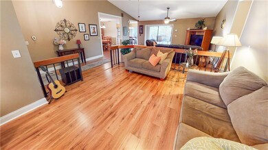 A flowing, open floor plan with vaulted ceilings.