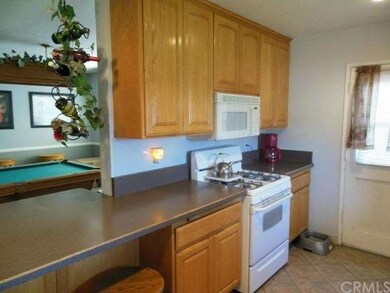 Lots of counter space. Bar seats 6! Looking into d