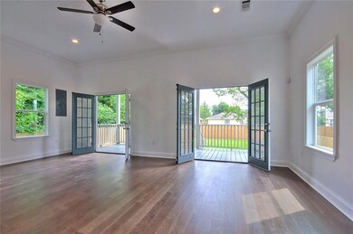 2 sets of french doors opening to large back porch