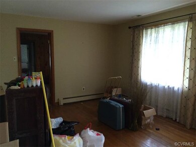 Formal Living Room with Hardwood Floors.