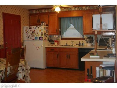 Cafeteria/Kitchen. Spacious kitchen with plenty of cabinet space.  Appliances staying