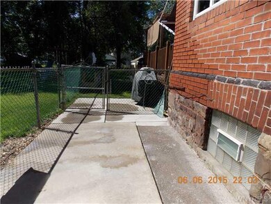 Other Side fenced concrete pad