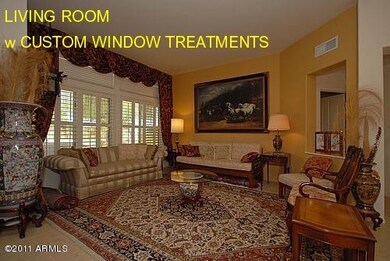Living Room w custom window treatments
