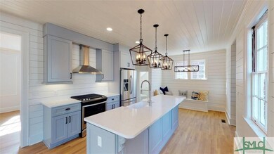 Pull up a stool to this huge Cambria quartz counte