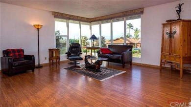 A large living room with beautiful natural light a