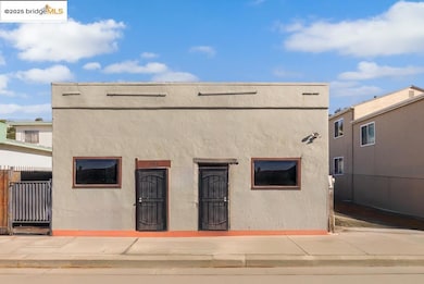 View of front of property featuring stucco siding