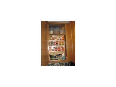 Kitchen. Built-in pull out spice cabinet with spac