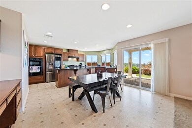 Plenty of Room Between Kitchen and Family Room for Informal (or if you prefer Formal) Dining.