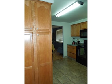 Kitchen also includes pantry