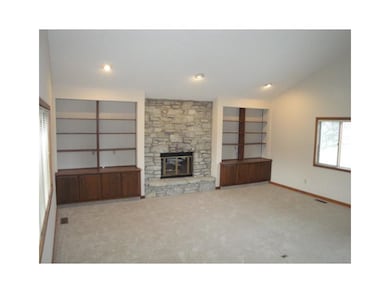 Great Room. You can t imagine the open, grand feel this Great room has.  Built in bookshelves, stone fireplace, windows overlooking the golf course.  You ll love it and might not see another unit exactly like this  one.