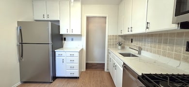 Enjoy brand new stainless-steel appliances and quartz countertops