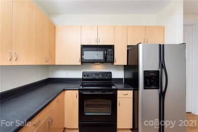 Modern kitchen and lighting - plenty of cabinets a
