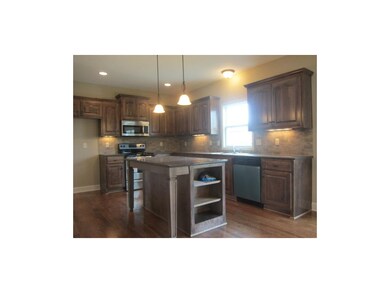 322 Sycamore St, Raymore, MO 64083 - photo 5