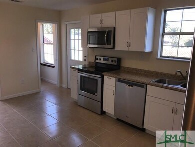 Outside door to private backyard, and pantry