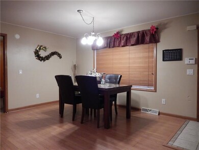 Dining room has picture window & new laminate floo
