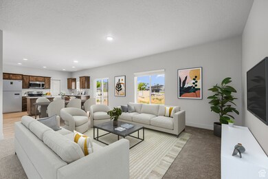 Living room with recessed lighting, light colored carpet, and a textured ceiling
