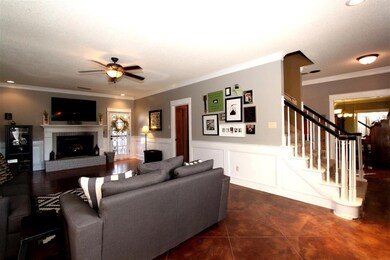 Concrete floors and fireplace.