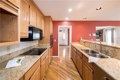 1305 Chesapeake Avenue, Hampton VA Beautiful granite counters, Smooth surface stovetop, microwave, dishwasher and refrigerator convey.