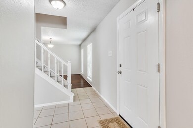 Entryway looking toward formal dining area or flex room to have second living