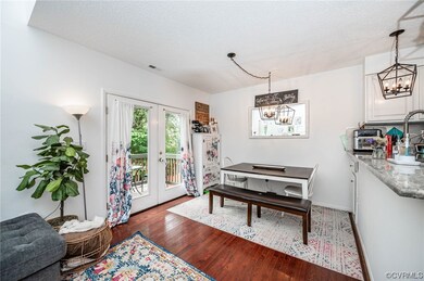 Open Dining area to kitchen and LR with dark hardw