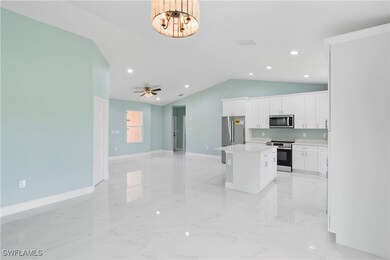 Kitchen featuring stainless steel appliances, a ki