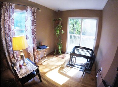 Sliding glass doors in the living room offer conve