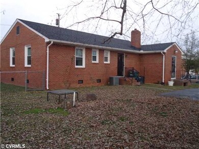 Exterior Front - Fenced rear yard with rear paved 