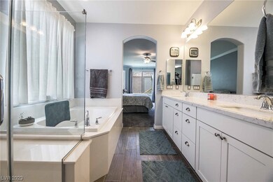 Downstairs primary spa bath features garden tub pl