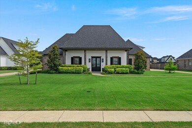 View of front of property with a front lawn