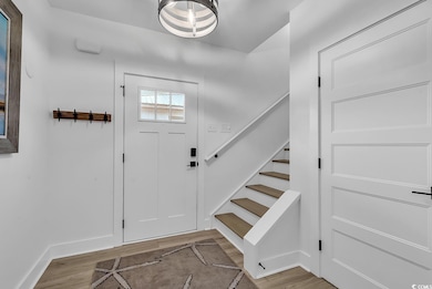 Foyer featuring light wood-type flooring