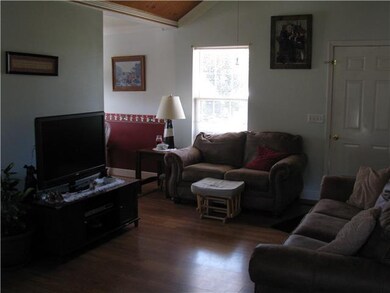 Living room leads into the kitchen. Roomy and open