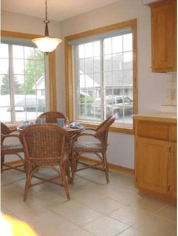 Large corner windows create a lovely breakfast cor