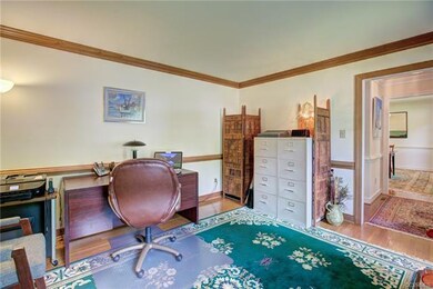 Living Room/Office with hardwood floors, chair rai