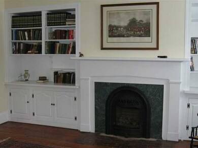 Foyer. Beautiful custom made bannister.