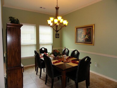 Formal dining room w/crown & chair rail molding