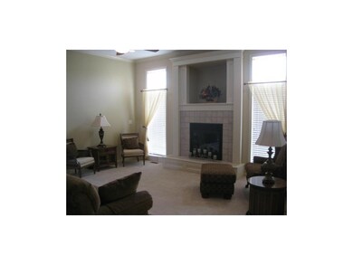 View of living room from kitchen area. Crown Mould
