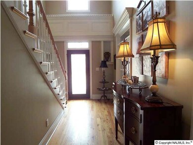 Welcome to Southern Living! The Beautiful Front Door leads into the two story Foyer with warm Hardwood Floors, Crown Molding & Elegant Staircase. The Study is off of the Foyer with French Doors, and access to a full bathroom.
