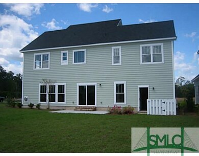 Exterior Back. Stately Home on Lagoon View Lot