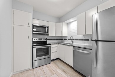 Kitchen has ss appliances & custom cabinets