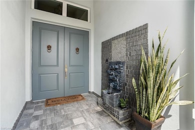 Front Entry With Wall Fountain