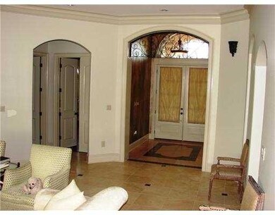 Foyer. Foyer has gorgeous travertine tile flooring
