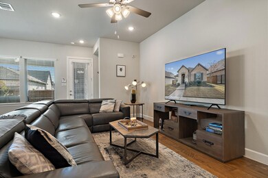 Living room featuring wood-type flooring and ceili