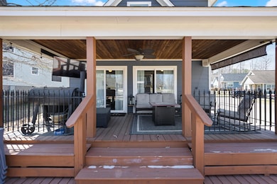 Deck with ceiling fan and fence