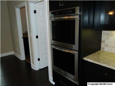 the stainless steel ovens are kitchen aid with the op oven being a convection oven for fast cooking.