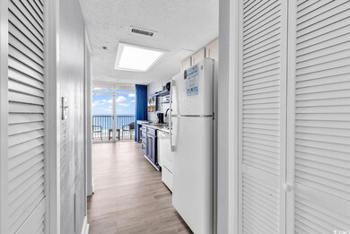 Kitchen featuring floor to ceiling windows, freest