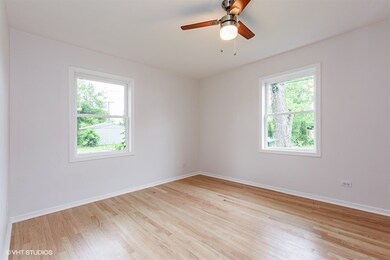 New windows, fan and freshly painted. Hardwood flo