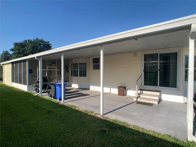 Screened Porch 12 x 15' at back of carport with main entry to house.
